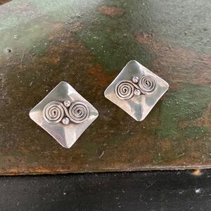 Ella L. Cone sterling silver buttons